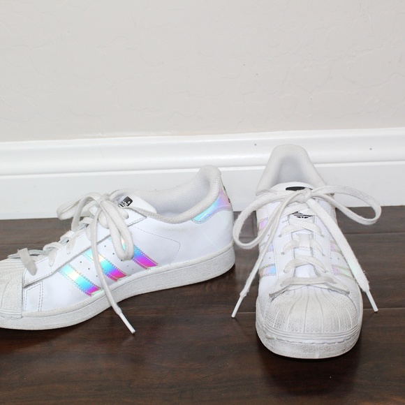 white adidas with holographic stripes